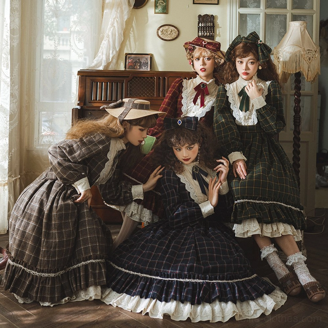 Coordinated lolita flat hats and plaid dresses ensemble, wide interior group shot of four female models in matching retro plaid outfits in vintage bedroom setting