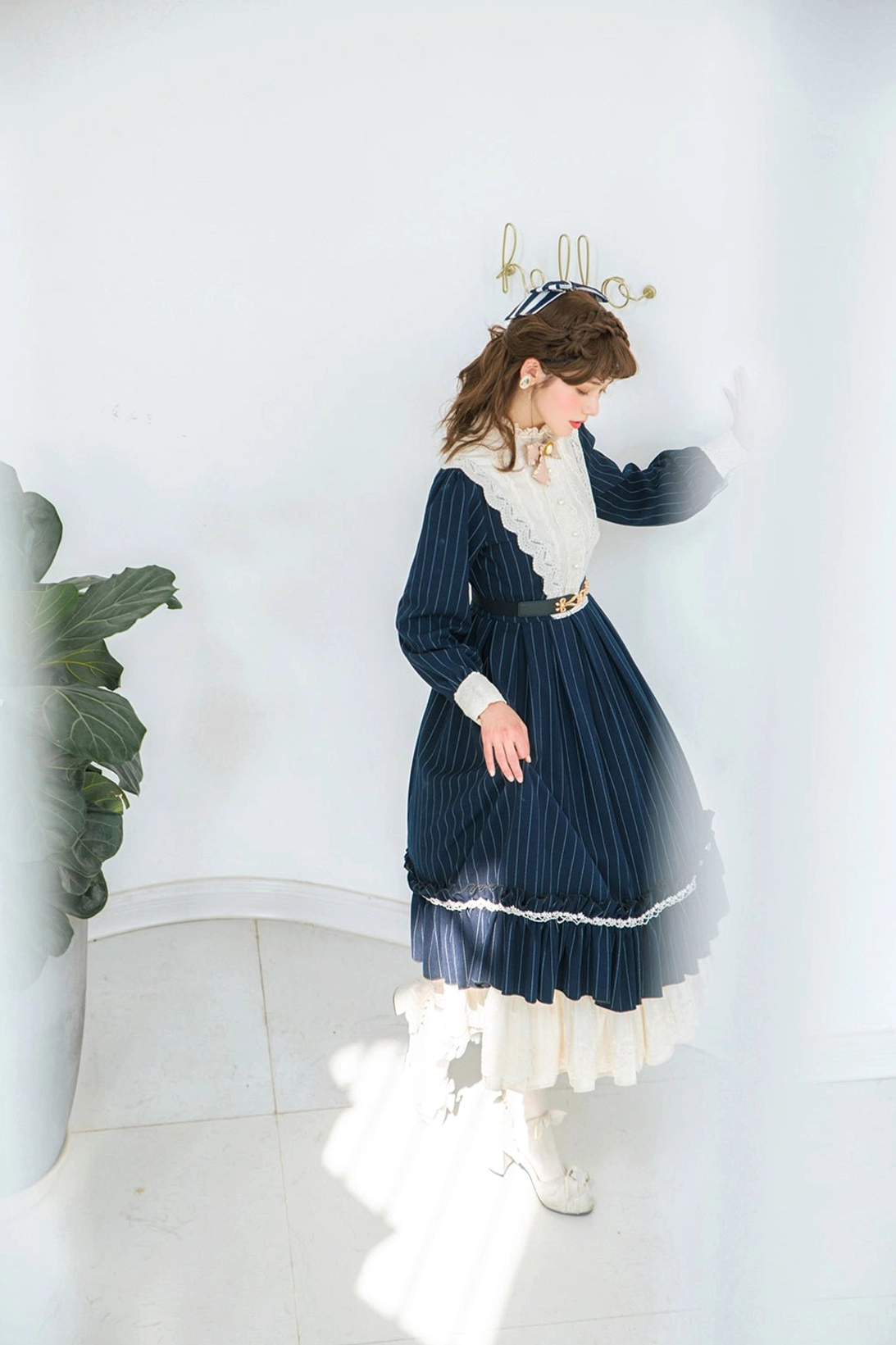Vintage Classic Lolita OP dress worn with Lolita accessories including hair ribbons, bag, and jewelry, full coordinate styling example