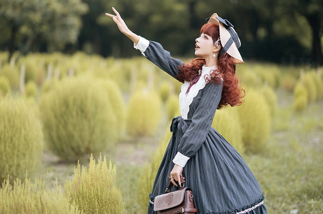 Vintage Classic Lolita OP dress puff sleeve and shoulder detail showing fabric draping and construction quality in classic striped pattern