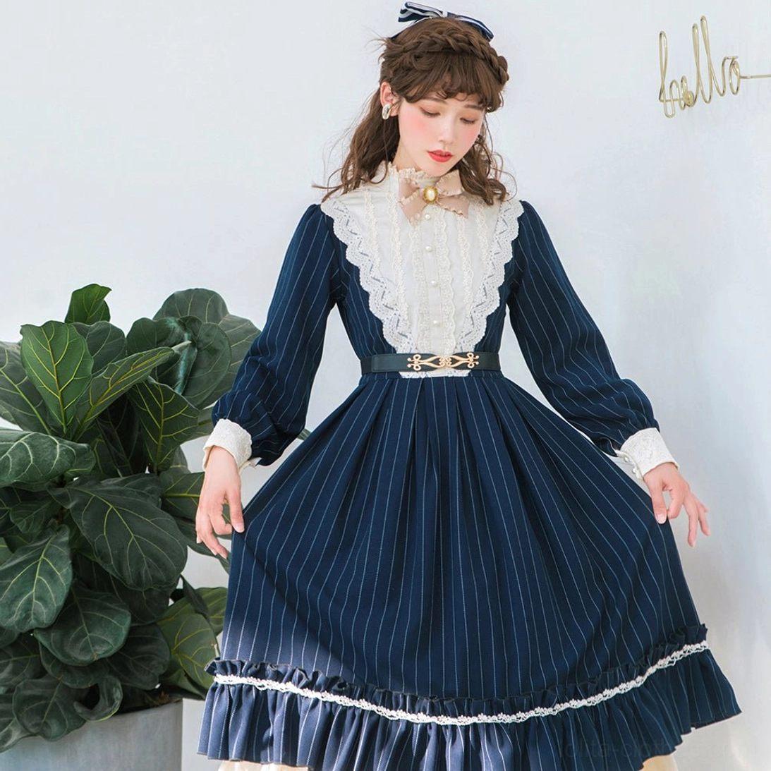 Vintage Classic Lolita one-piece dress featuring dark cyan striped pattern with white lace yoke, metal waist belt, and tiered pleated skirt with lace trim, half-body front view