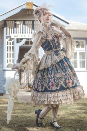 Royal blue vintage lolita JSK dress side view model wearing baroque floral printed jumper skirt with layered ruffled lace hem big puff sleeves paired with vintage lace umbrella suburban cottage outdoor