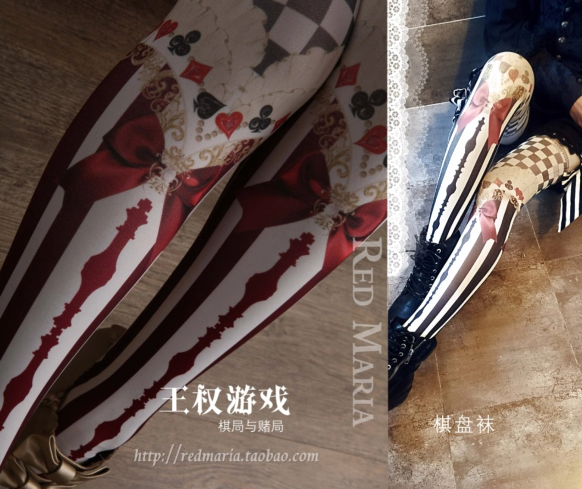 Overhead close-up shot of Royalty Game Chessboard Lolita Tights showing red and white vertical stripes with large red bow prints and playing card suit patterns
