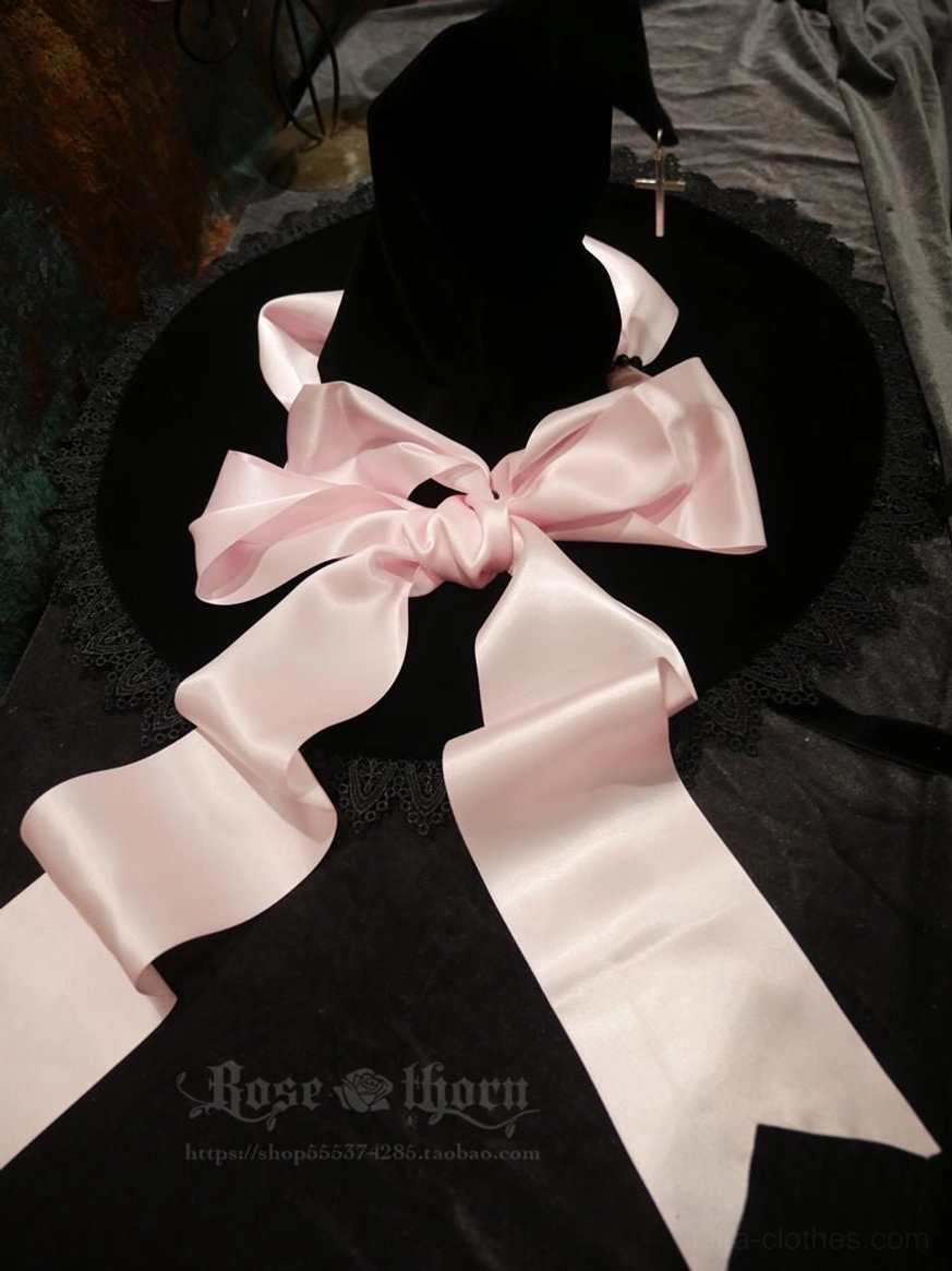 Top-down front view black velvet witch hat with light pink satin bow silhouette sweet gothic lolita style