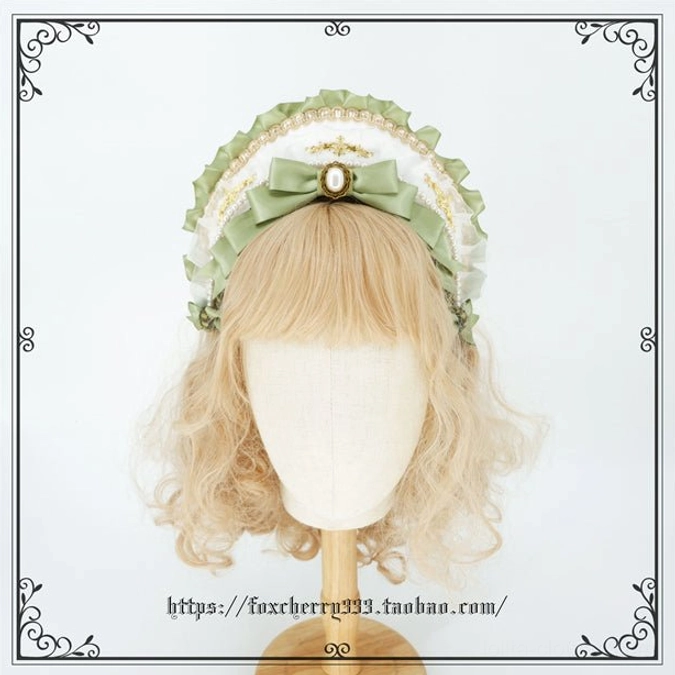 Sage green Lolita headdress collection display showing all five style variations arranged with coordinated aesthetic and pearl ornament details