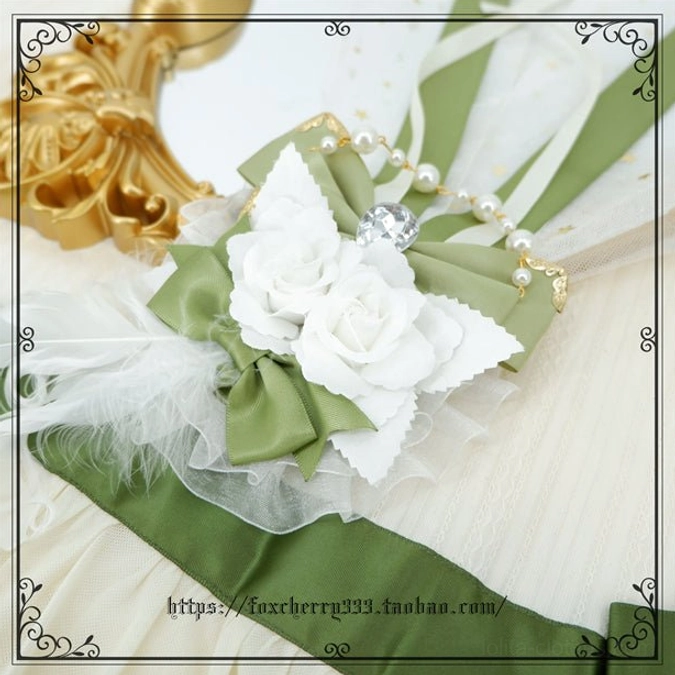 Sage green Lolita headdress accessory trio arrangement showing coordinated pieces with bows pearls and lace trims for complete styling