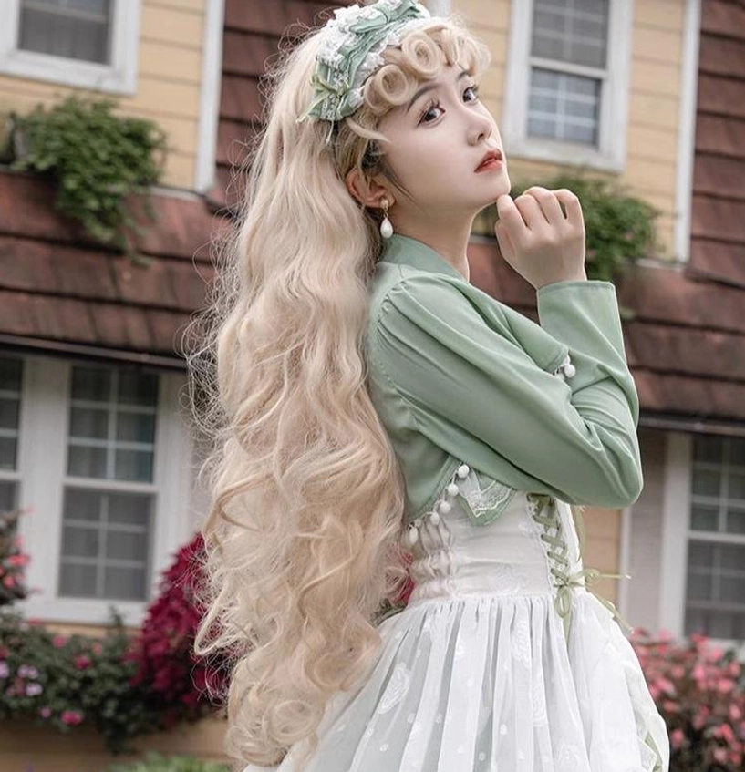 Sage green plus size wedding lolita JSK displayed on model showing how adjustable corset straps and drawstring waist accommodate different body types and sizes