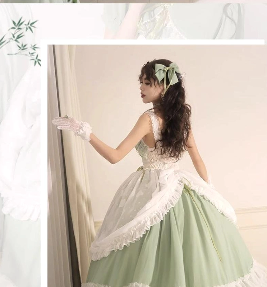 Side back full-body view of sage green lolita wedding dress JSK showing sheer white overlay, layered ruffled petticoat, matching bow, and lace glove details
