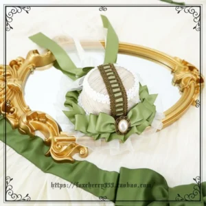Sage green Lolita mini top hat headdress with scalloped lace trim pearl drop ornament and ruffled collar details displayed on vintage golden mirror