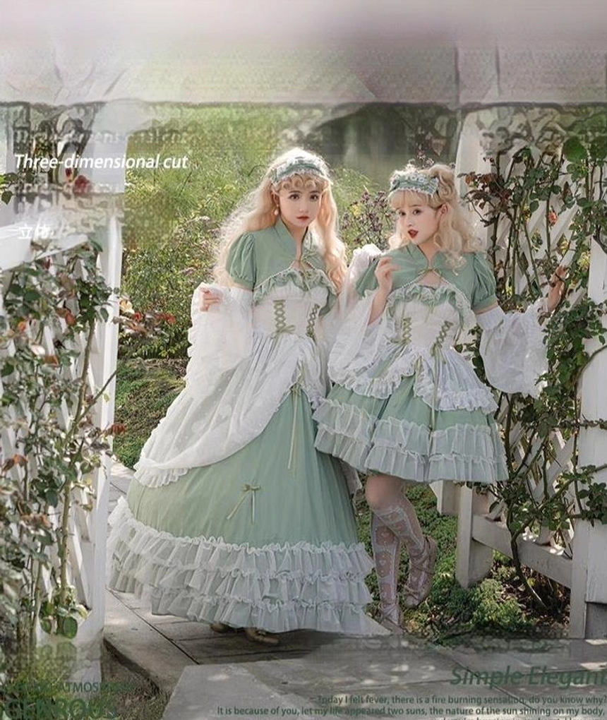 Side-by-side comparison of sage green lolita wedding JSK in long and short versions worn by two models in outdoor garden setting with matching flower headpieces