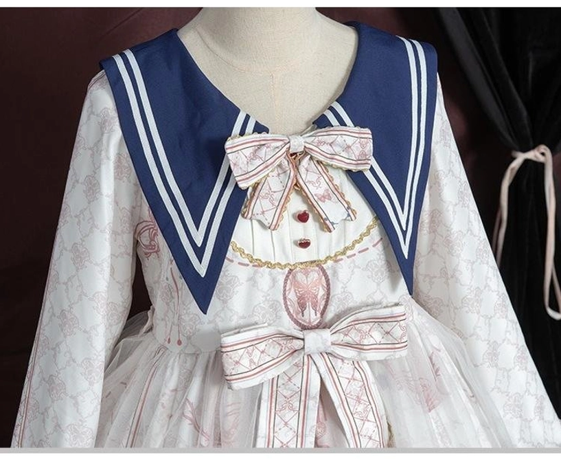 Sailor collar lolita op dress three-color presentation navy blue white and black color options available, baroque print consistent across all variations