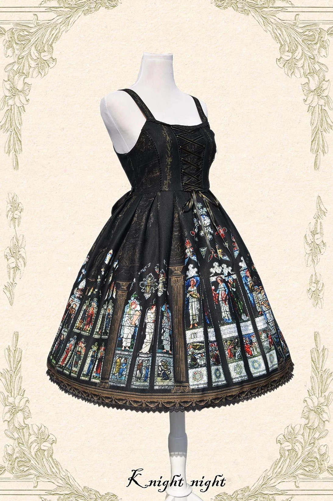 Front cross-strap harness detail of Saint Priest Lolita JSK with lace-up corset bodice, stained glass print, showing construction quality and ecclesiastical design inspiration