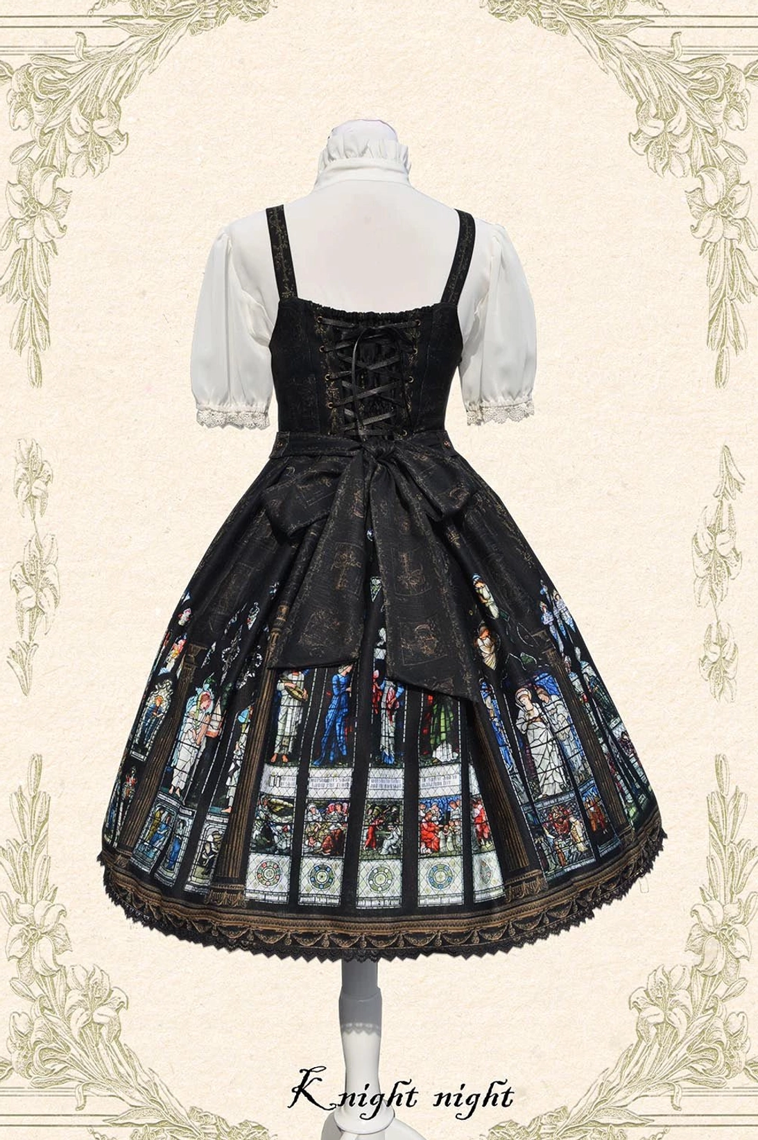 Side profile view of Saint Priest Lolita JSK showing silhouette, stained glass print skirt fullness, cross-strap structure, lace hem proportion and overall aesthetic
