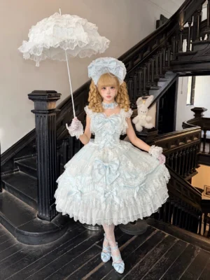 Sky-blue sweet Lolita jumper skirt with tiered tulle ruffles and lace overlays holding parasol vintage mansion