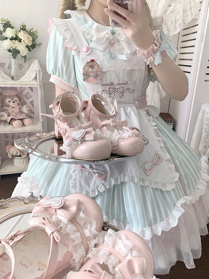Sweet Lolita Mary Jane heel shoes styled overhead with model wearing matching mint pink sweet lolita dress in vintage bedroom setting with lace bow heart decoration ankle strap