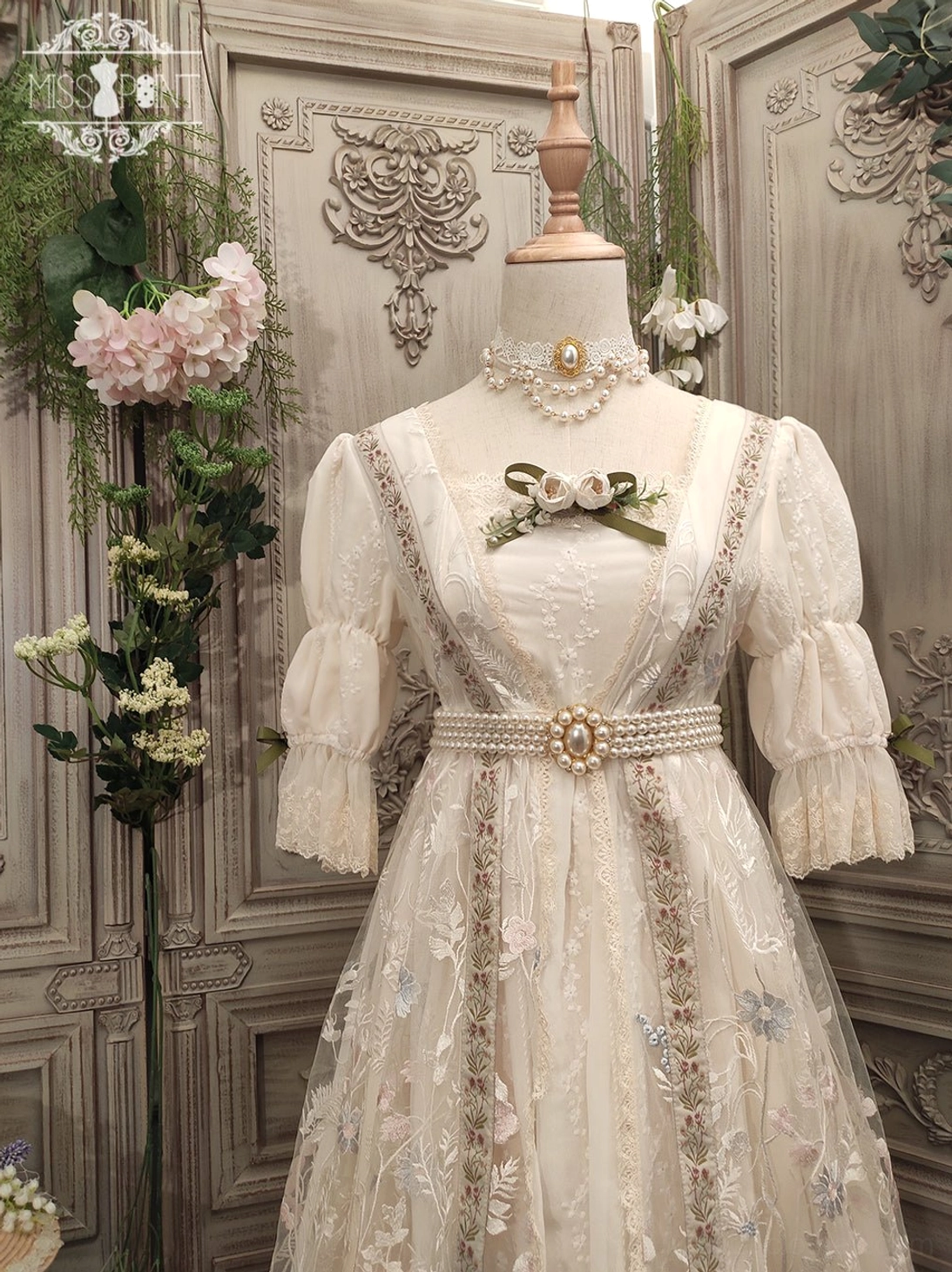 Sally's Garden handmade lolita ribbon belt with pearl beading displayed on vintage empire waist dress with beige lace and floral embroidery