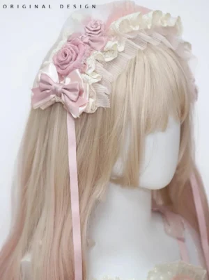 Satin ballet sweet lolita pink feather bow headdress right profile view with cream ruffled lace and fabric roses on blonde-pink gradient long wig mannequin