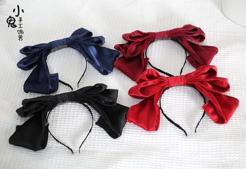 Premium satin fabric texture quality layered bow Lolita hair clip material close-up lustrous finish elegant appearance