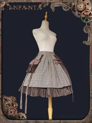 Front full-body dress form display of separated plaid and velvet lolita SK skirt with ruffled velvet hem, decorative hanging straps, side patch pockets, and flowy silhouette against steampunk background