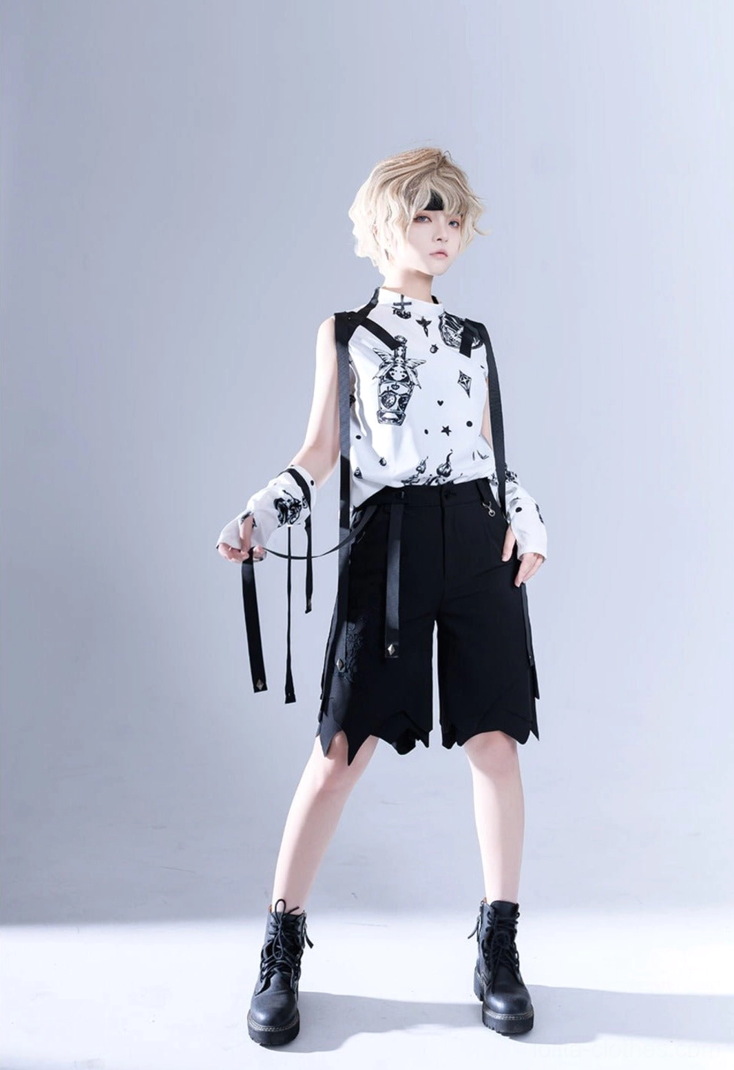 Shadow Story Ouji lolita sleeveless summer shirt featuring black and white gothic strawberry and wing print with detachable cuffs and ribbon chest accessories for alternative fashion styling