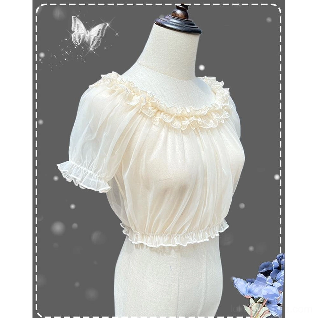 Cream sheer mesh short-sleeve Lolita inner blouse with ruffled round neckline puff sleeves and elastic hem on dress form with blue flower butterfly ornaments
