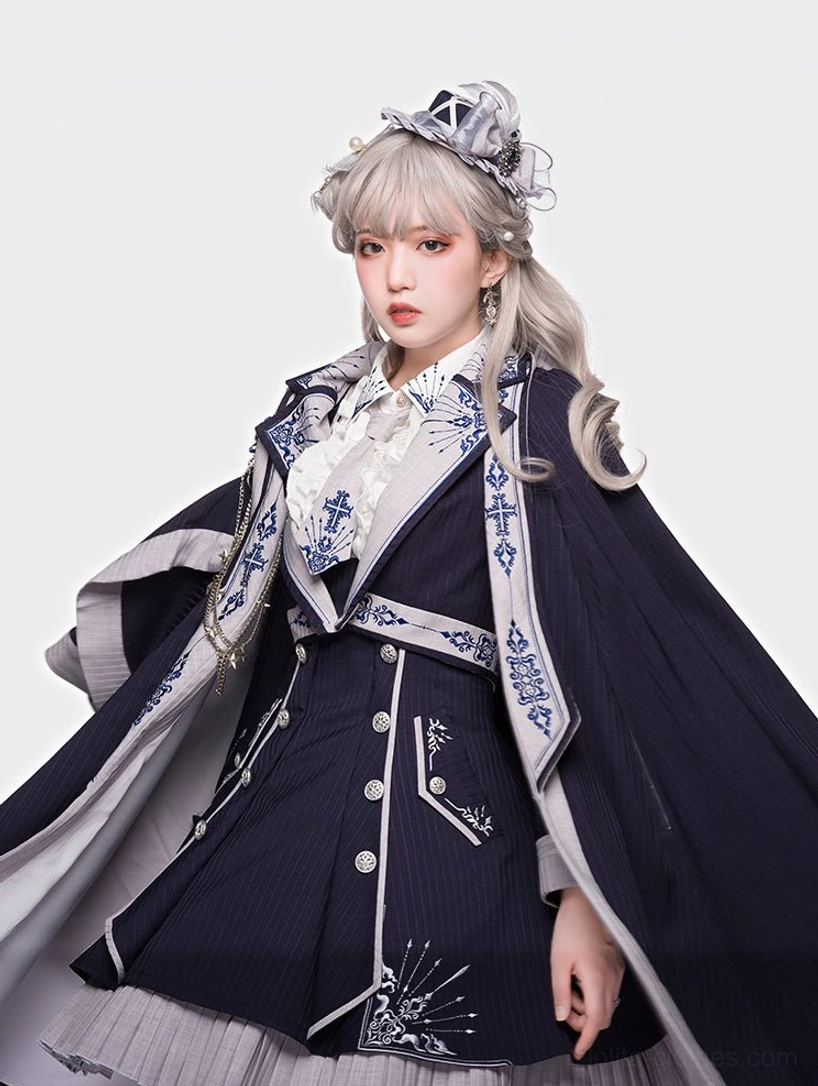 Sheffield military Lolita outfit close-up front view showing flowing grey cape lining delicate collar embroidery elegant formal