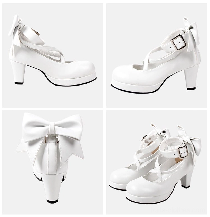 Shining black metallic Lolita platform heels with glossy reflective iridescent finish, crossover ankle buckle straps, large decorative back bow, round platform toe, and block heel