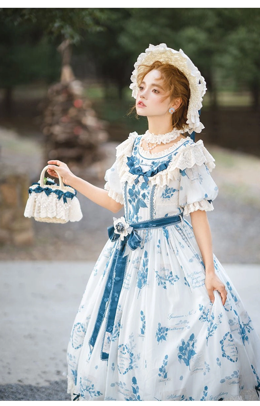 Short-sleeved one-piece Lolita dress front view showing high-waist design with puffed sleeves, blue and white print, and elongating silhouette proportions
