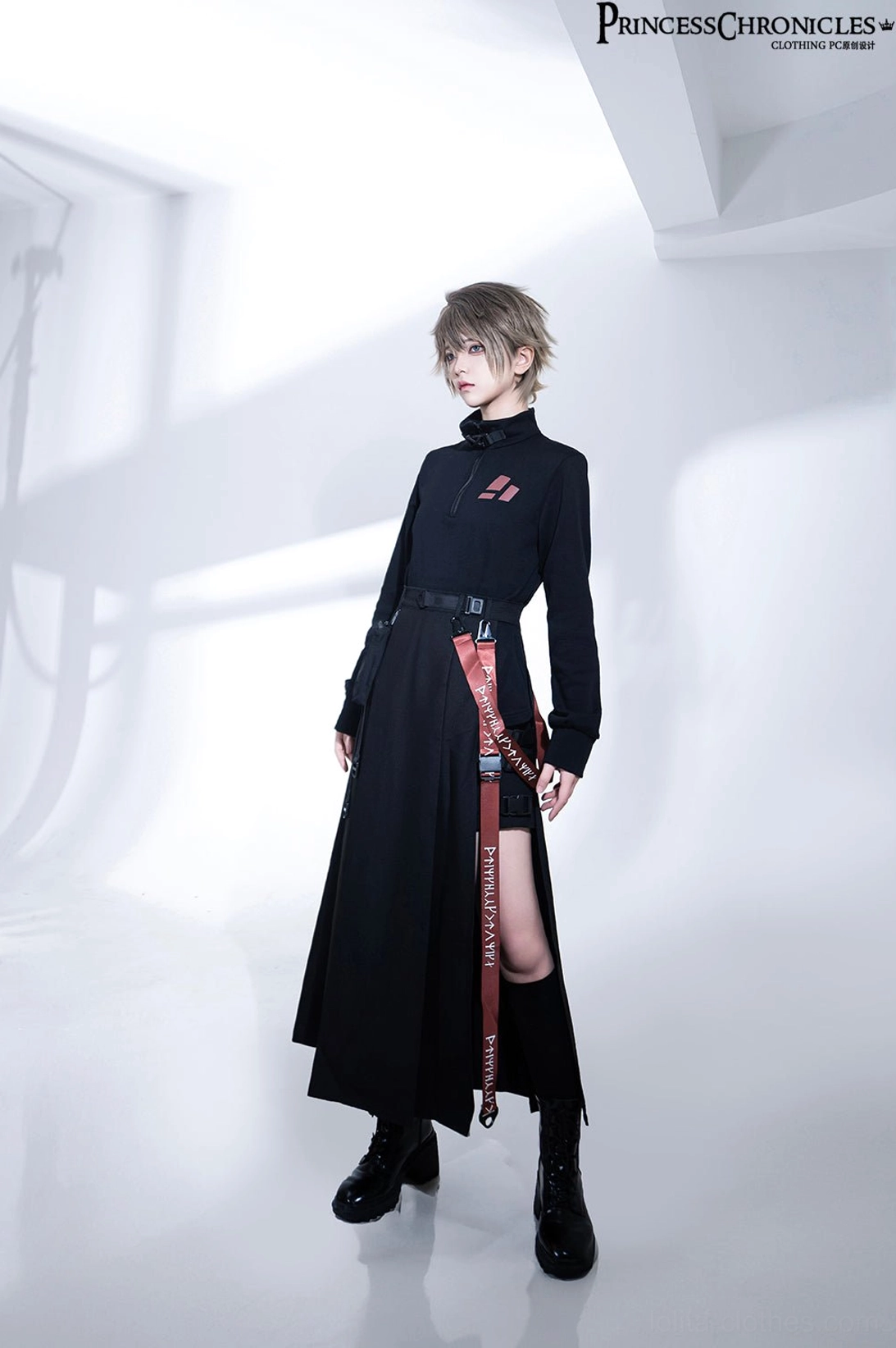 Side three-quarter techwear outfit perspective showcasing waist webbing utility detail and skirt silhouette