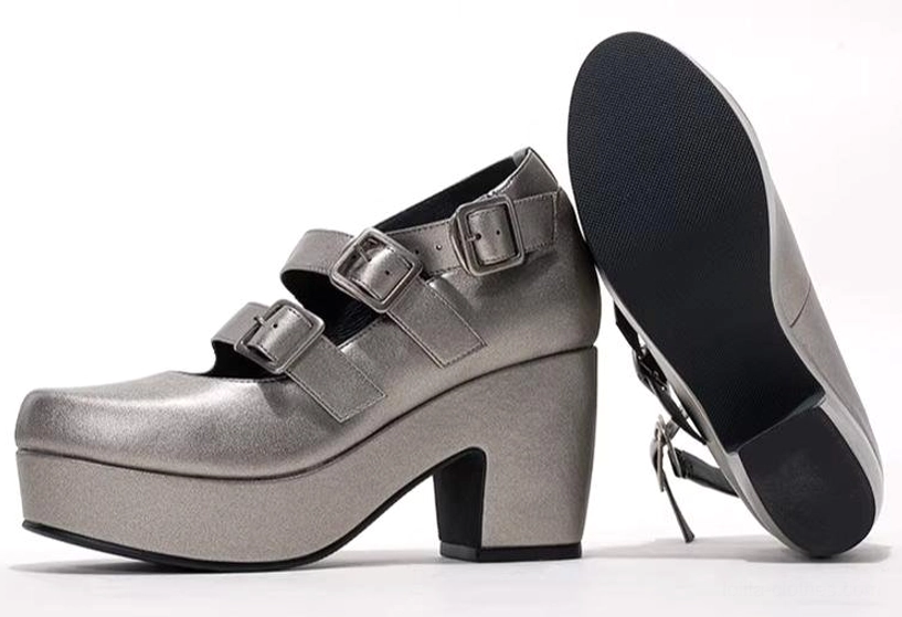Silver-grey triple-strap Gothic Lolita platform heel shoes flat lay and side view with visible rubber outsole, plain white background, three silver buckled straps, chunky platform block heel