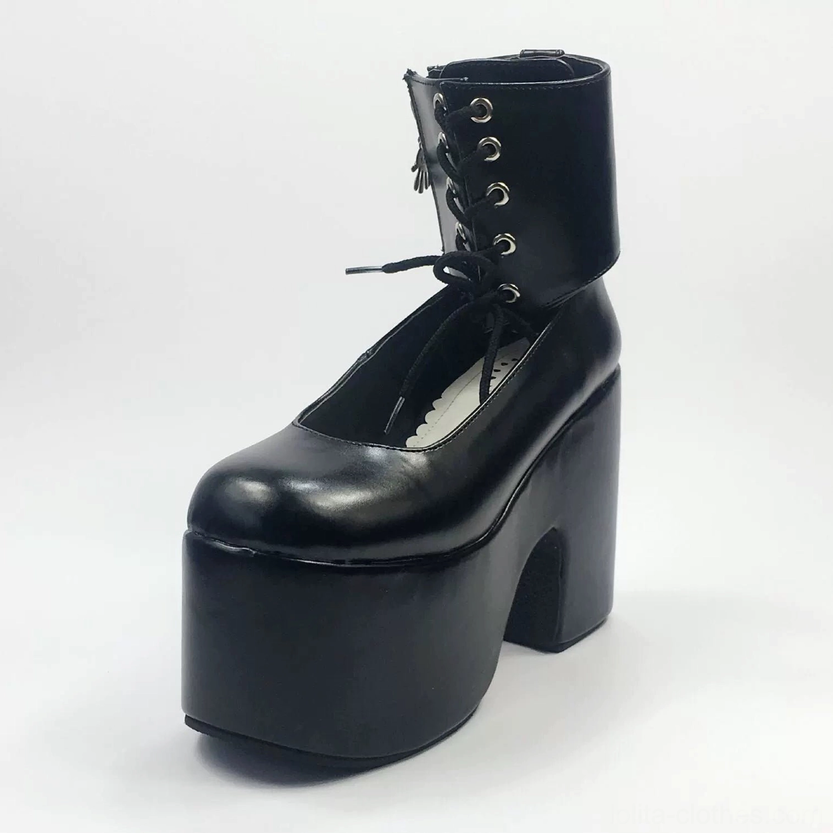 Single black lolita platform ankle boot front view displaying round closed toe, metal eyelet lace-up ankle collar, glossy leather construction and substantial thick platform heel