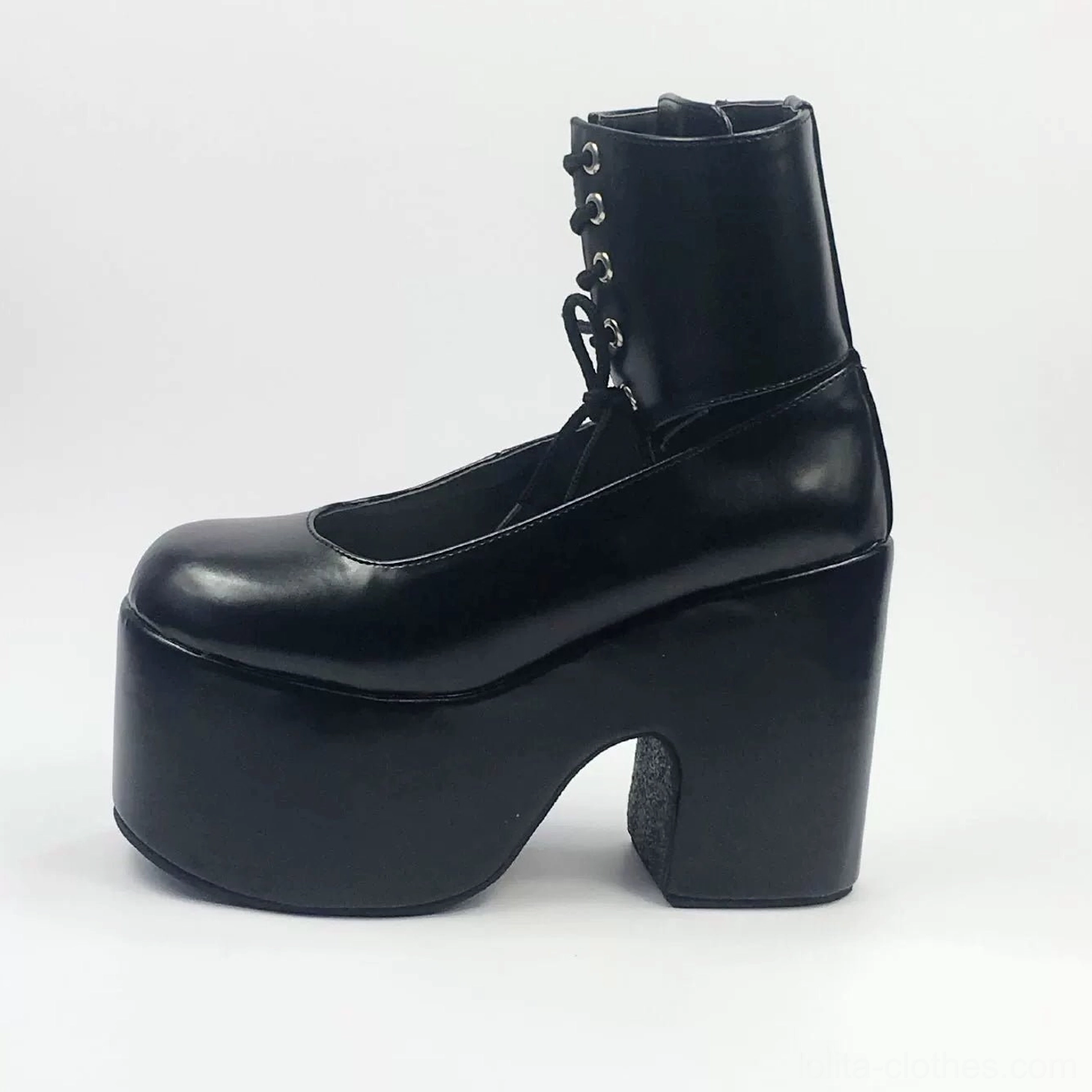 Single black lolita platform ankle boot showcasing glossy leather finish, thick block platform heel, functional side zipper on ankle cuff and lace-up decorative details rear view