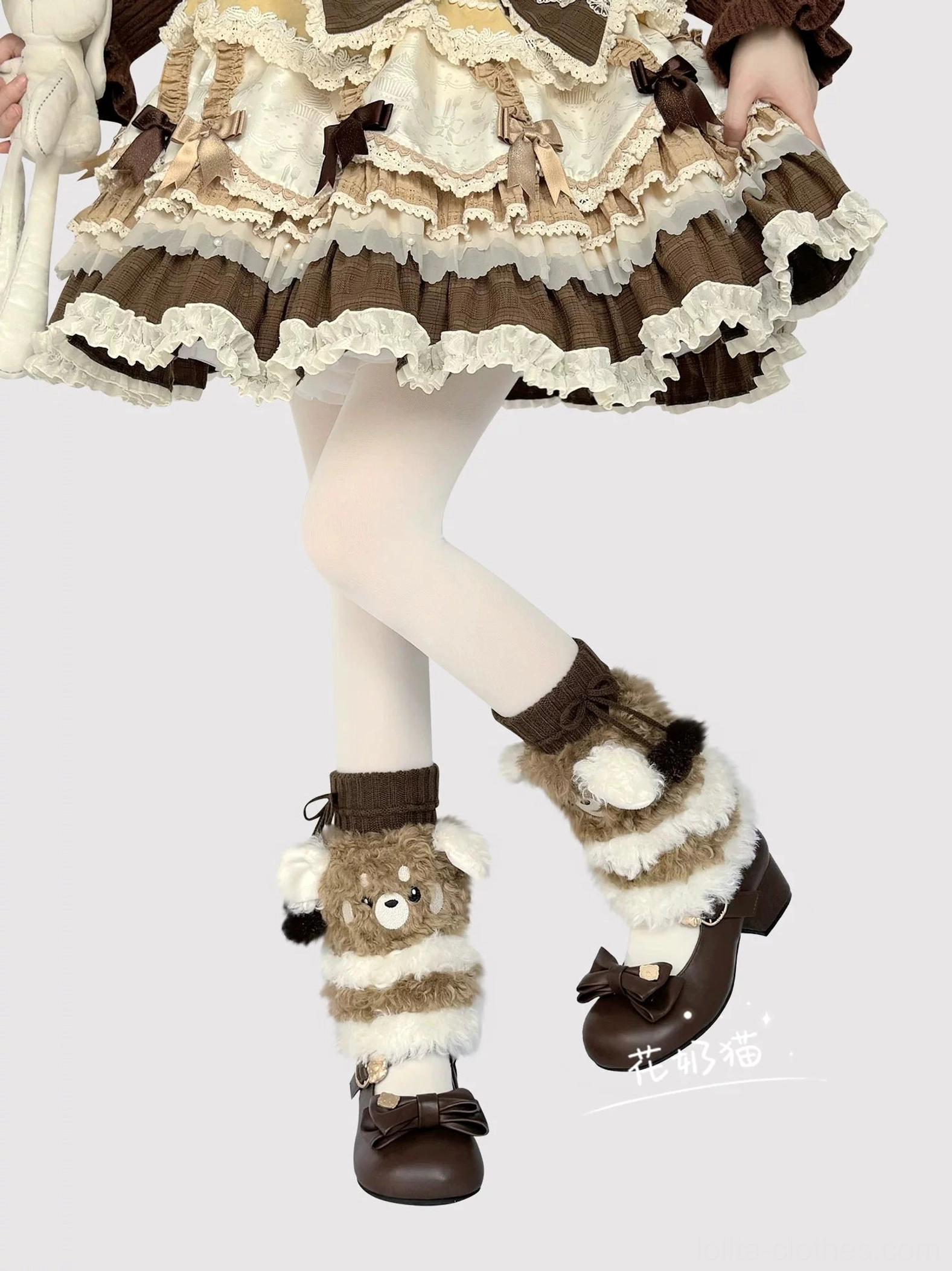 Single plush bear leg warmer side front view on one leg with tartan Lolita skirt showing bear head with visible ear and shoe display