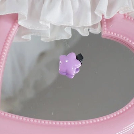 Single purple star hair clip detailed view emphasizing pastel tone authenticity and metal clip reliability