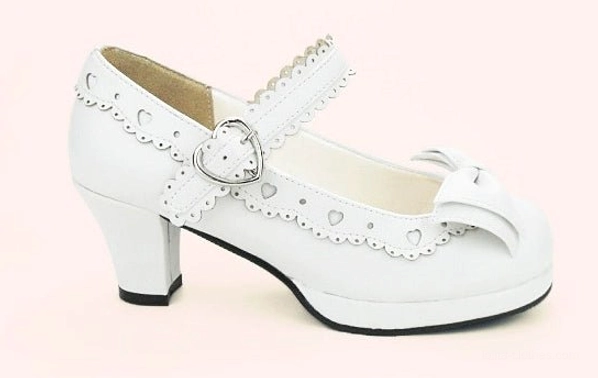 Single white lolita mary jane heel shoe three-quarter view with front bow and scalloped heart trim
