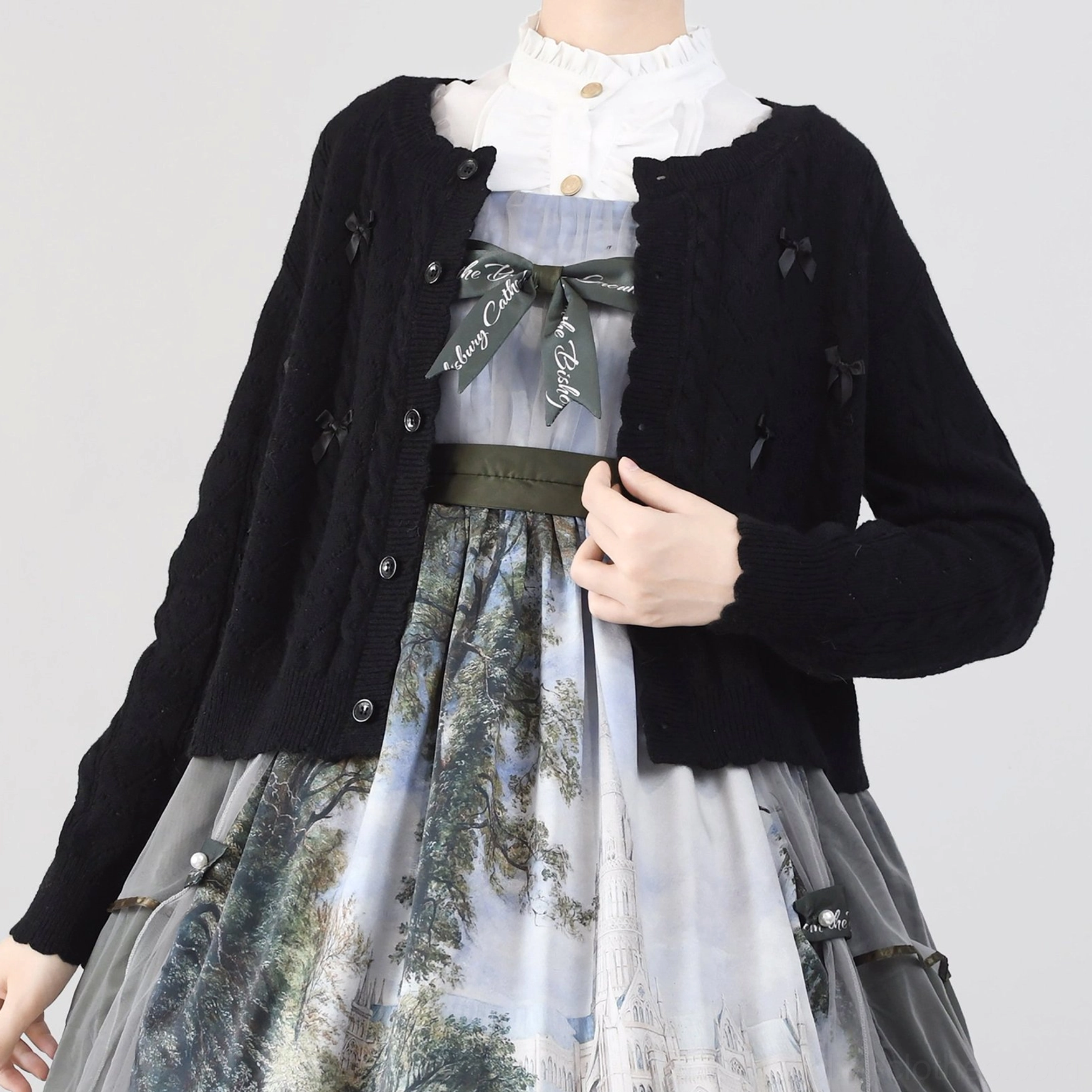 Size M dark brown hollow out Lolita cardigan worn by model, showing standard fit proportions and length