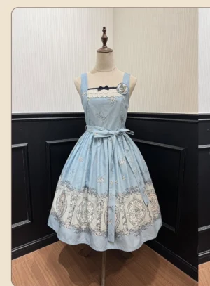 Sky blue lolita JSK dress front view on mannequin, porcelain plate printed hem, lace-trimmed neckline, detachable waist sash, studio display