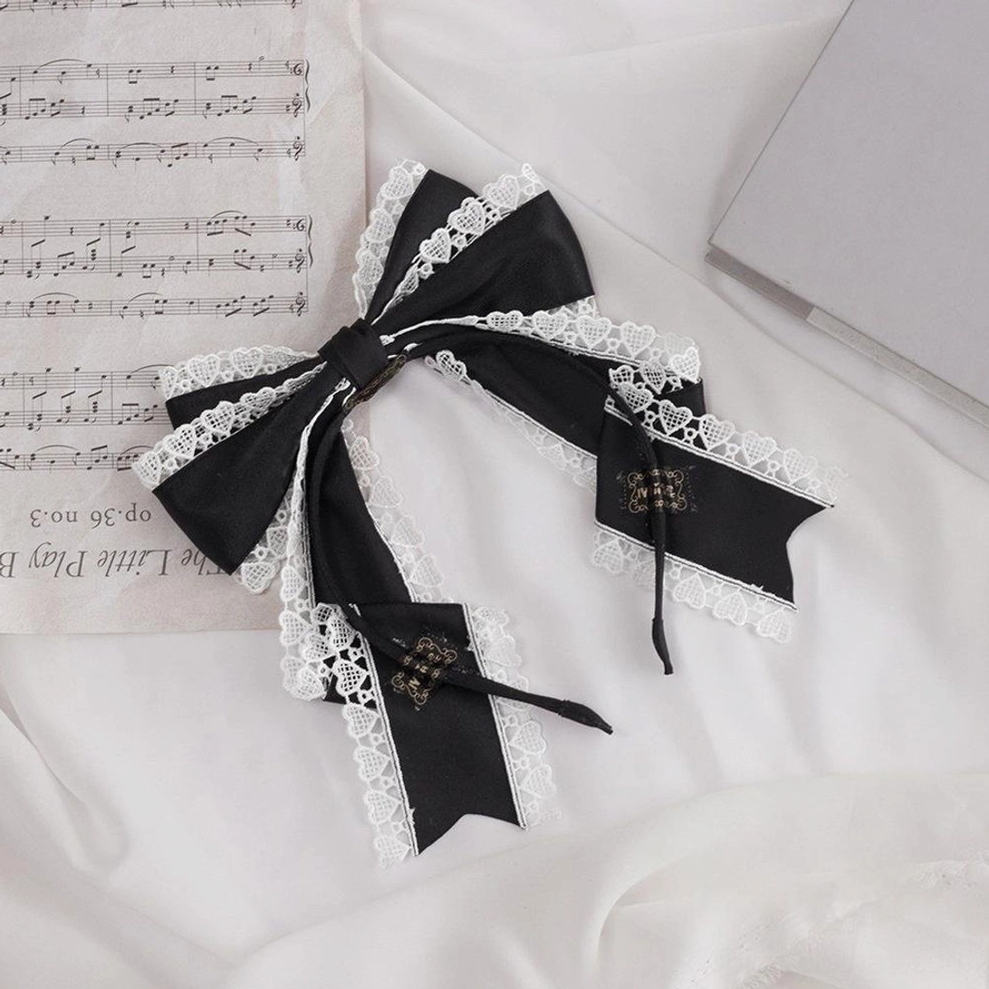 Sky blue clip-on sweet lolita bow hair accessory frontal product display view