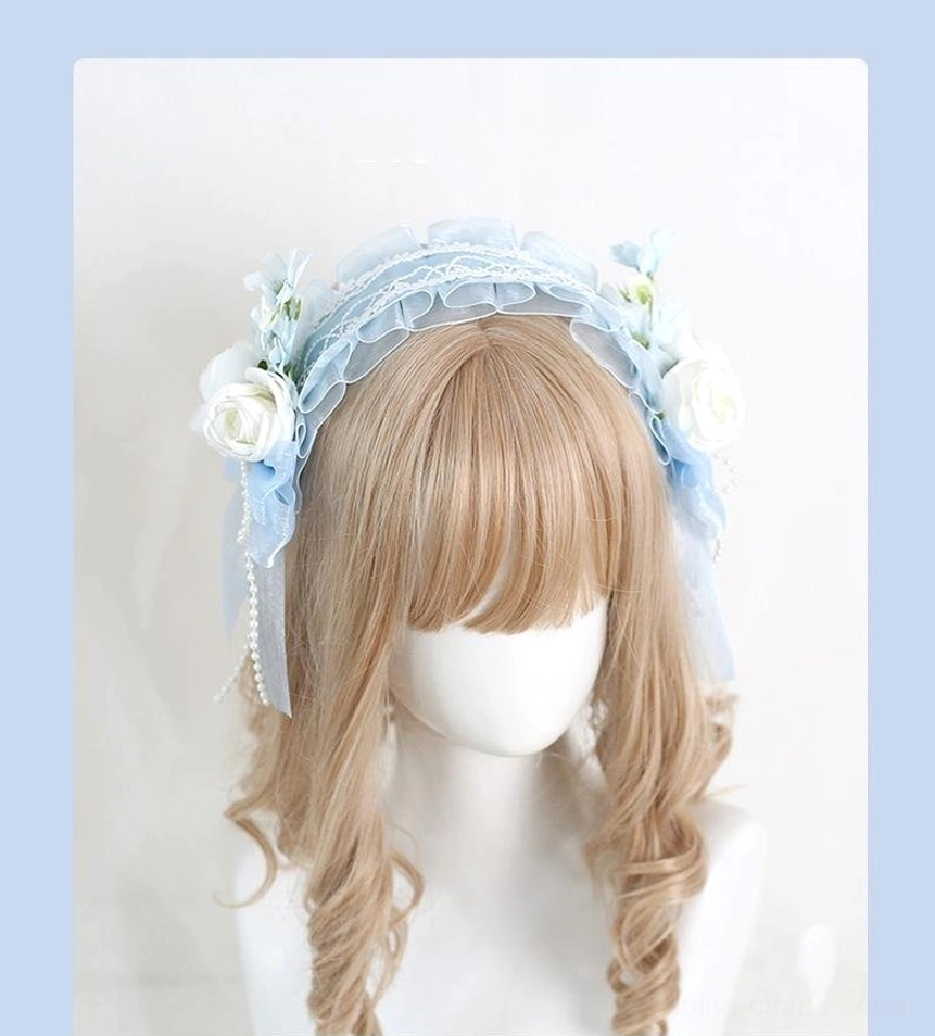 Sky blue elegant lolita floral lace headband with ruffled lace trim and white artificial roses on mannequin model