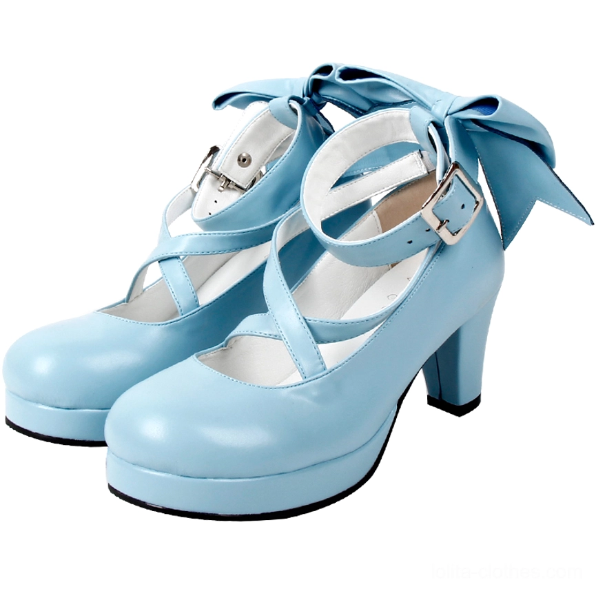 Sky blue Lolita platform high heel shoes in soft light blue shade, with crossover ankle buckle straps, small back bow detail, round platform toe, and block heel - front three-quarter shoe pair