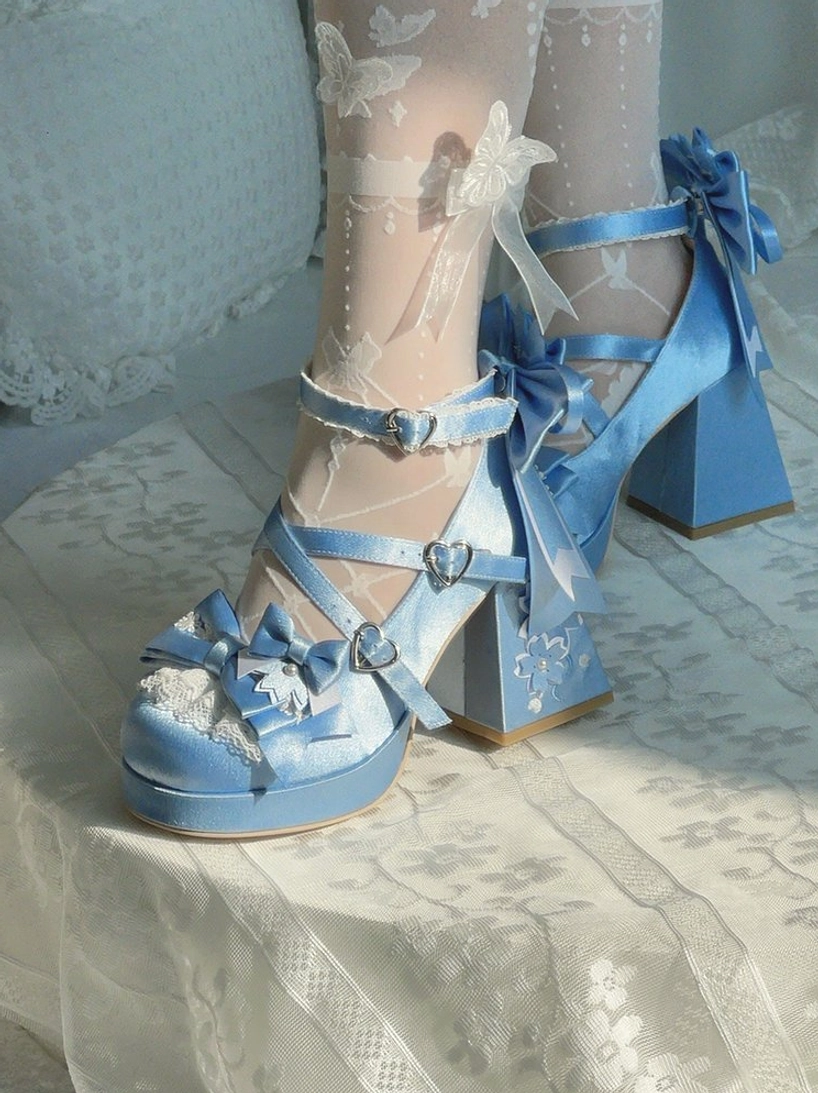 Sky blue sweet lolita chunky platform heel shoes with satin upper large back bow lace toe trims heart buckle straps worn with butterfly sheer stockings side close-up