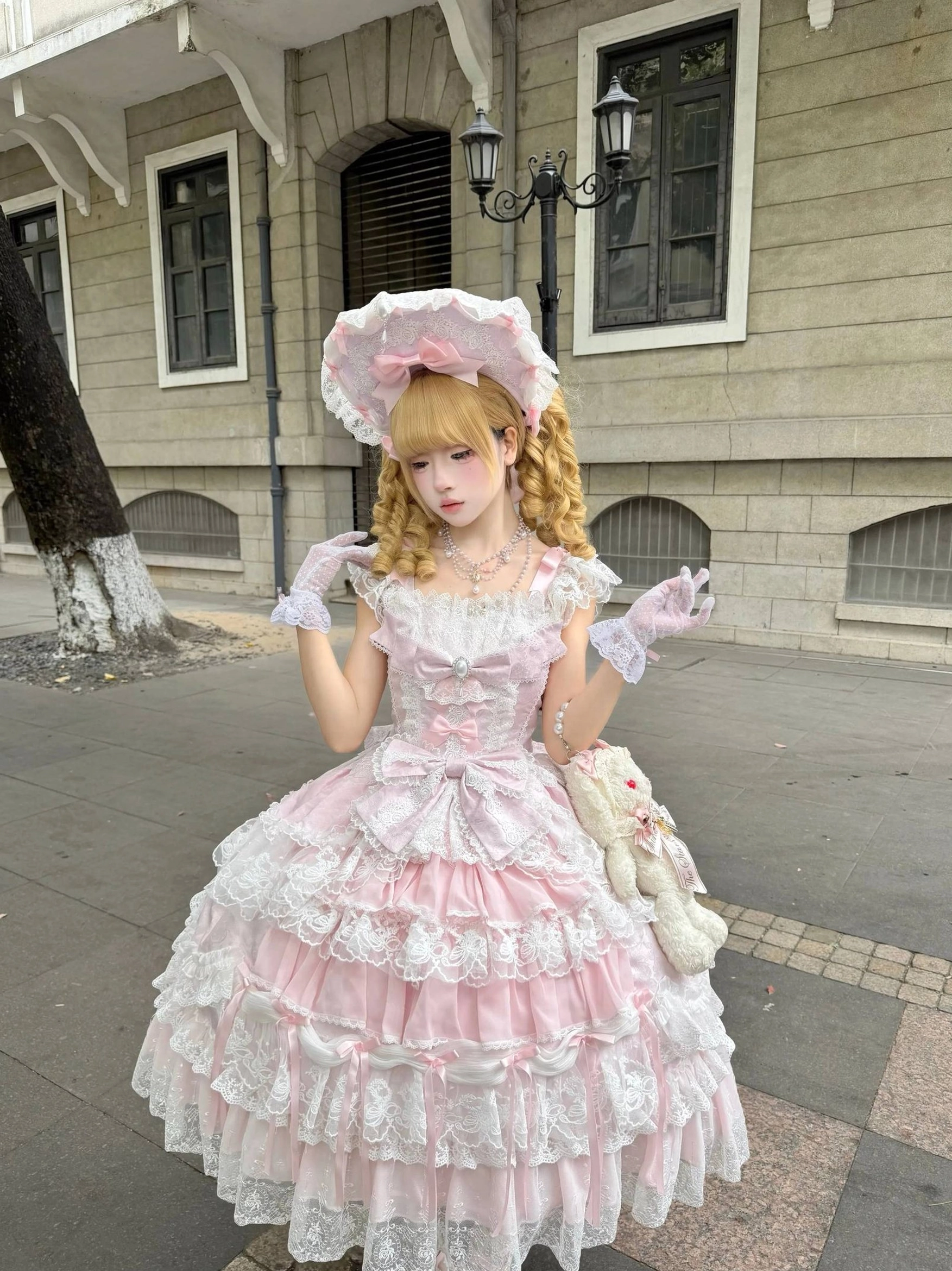 Sky blue sweet lolita tiered JSK dress full body view showcasing tiered lace construction and high-waist silhouette lengthening effect