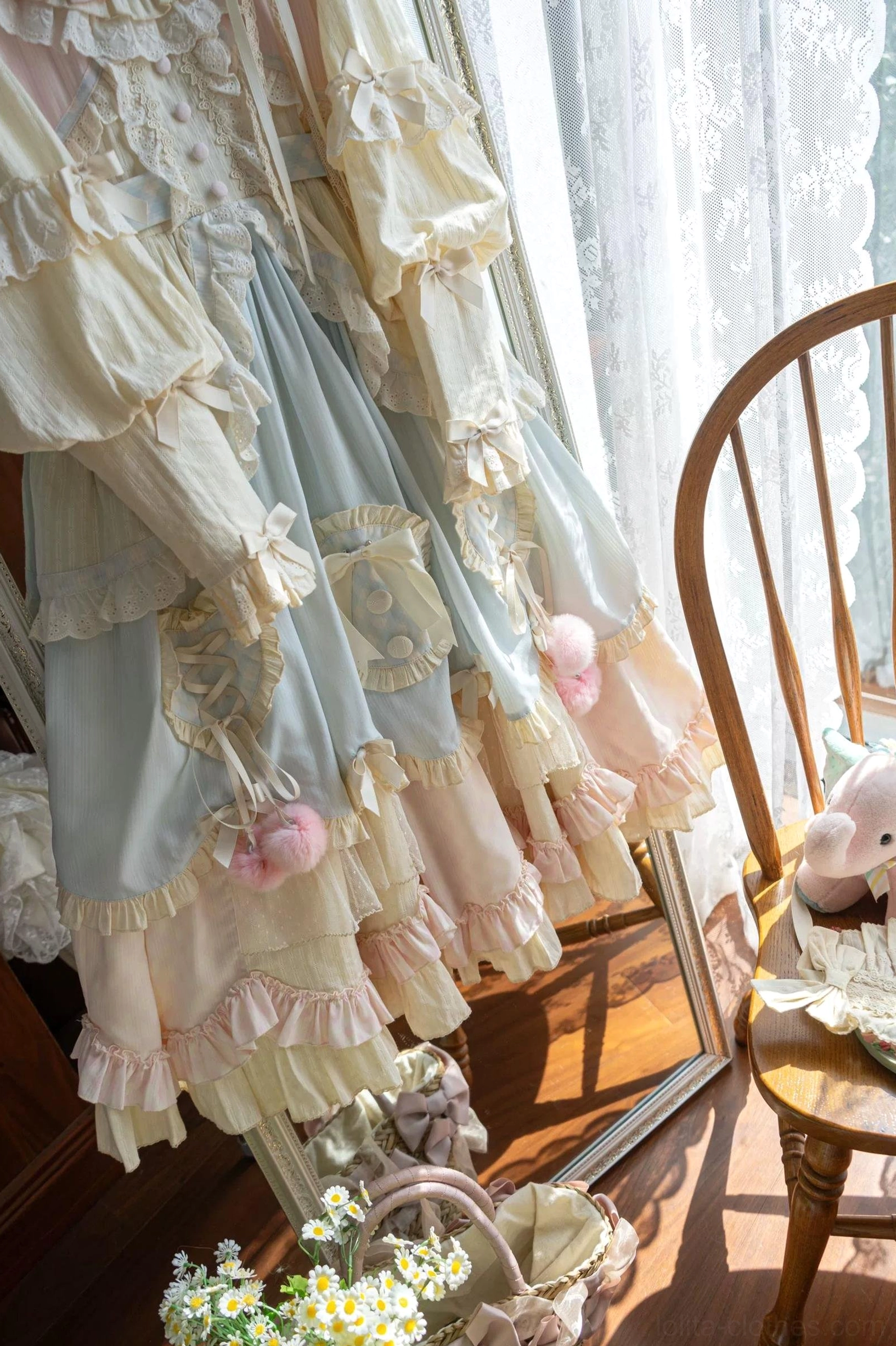 Sweet lolita OP dress sleeve detail showing puffed sleeve construction lace cuff trim and decorative button placement