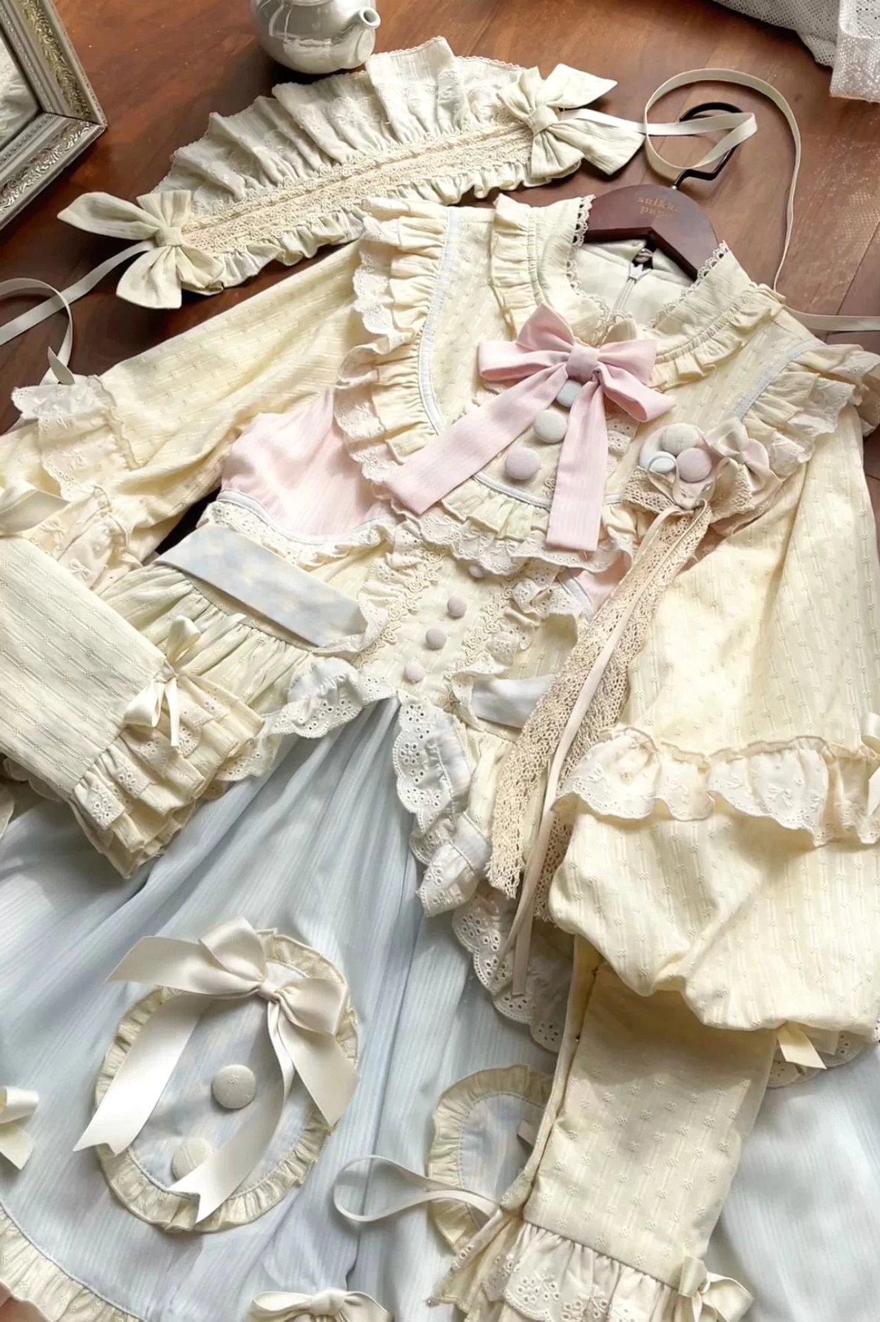 Rear zipper and waist belt detail of sweet lolita OP dress showing convenient back closure and adjustable waistline construction