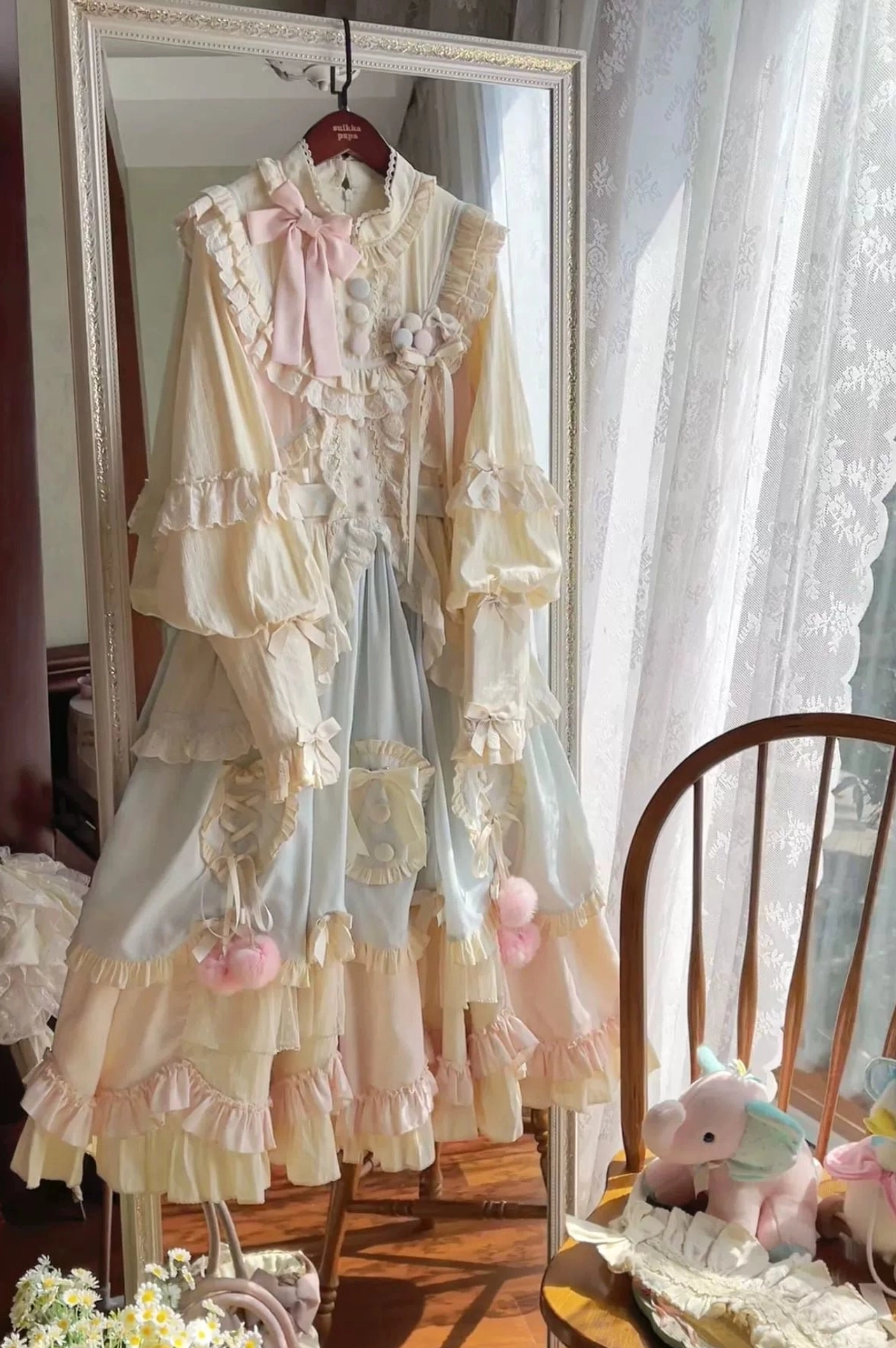 Sleep macaron sweet lolita OP dress ruffled hem and skirt construction detail showing multi-layered ruffles lace trims fabric texture