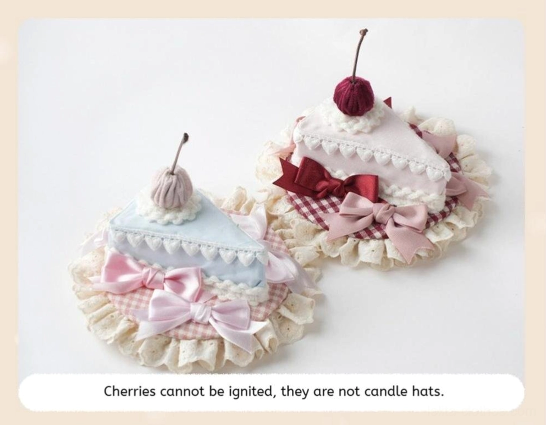 Slice cake themed sweet lolita hair fascinator with light blue cake slice base, pink gingham underlayer, multiple pink satin bows, crocheted fabric cookie topper, angled view