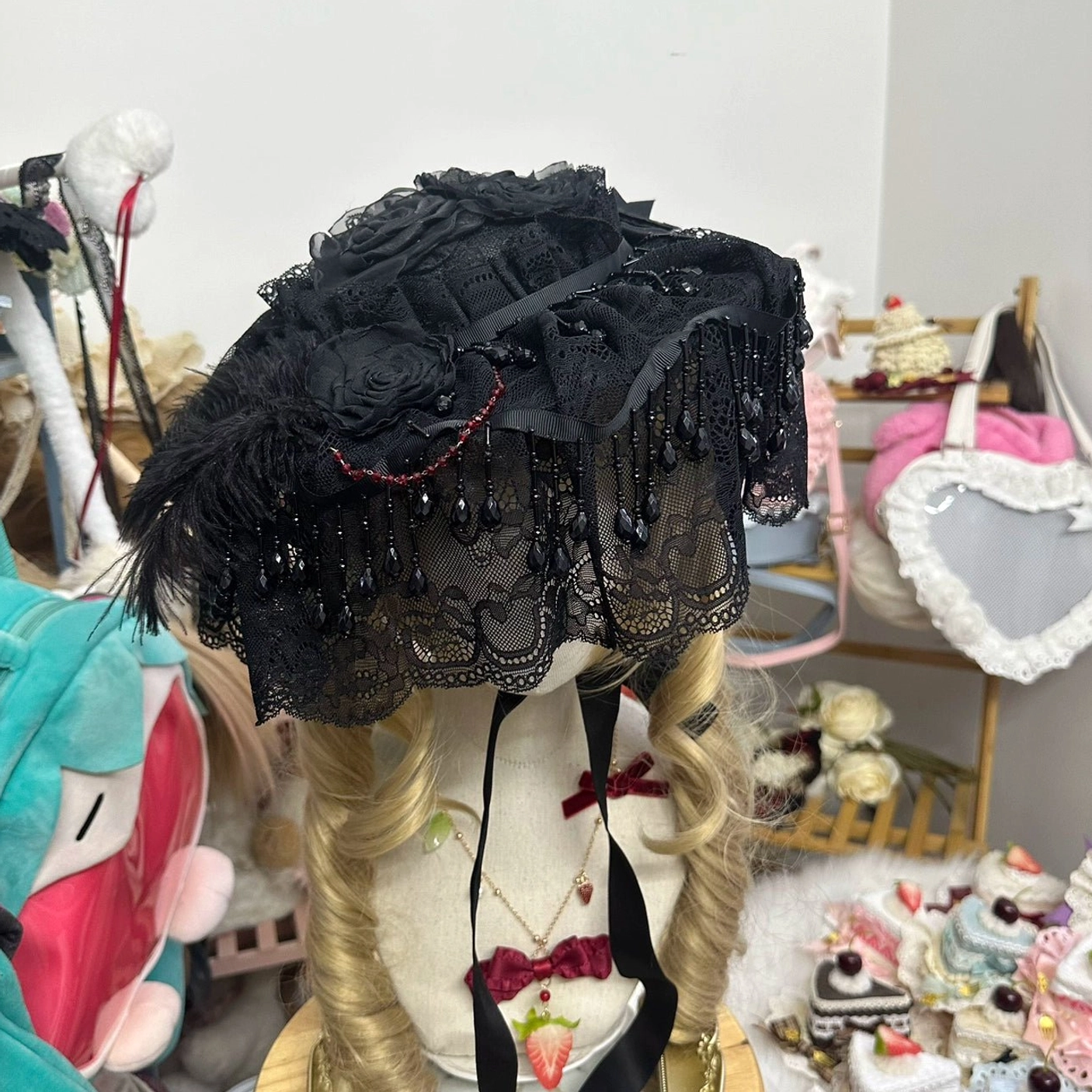 Small Gothic Lolita hat with beads and short black lace veil with dangling bead tassels and rose motifs