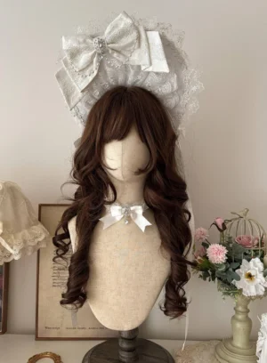 White Sweet Lolita lace bonnet with large satin bow displayed on mannequin with matching crystal drop choker styling