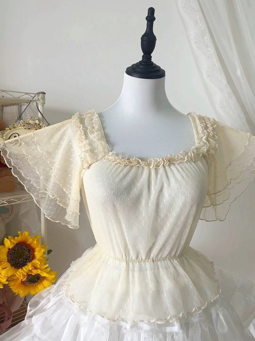 Soft beige sweet Lolita blouse with scalloped lace flutter sleeves and gathered fitted waist, close-up front view