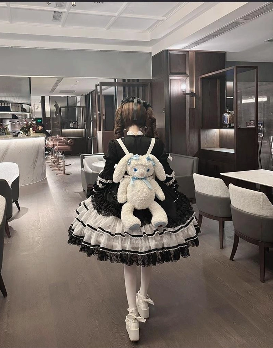 Sweet lolita OP dress A-line silhouette full skirt profile view showing bell-shaped princess lolita proportion flared skirt design