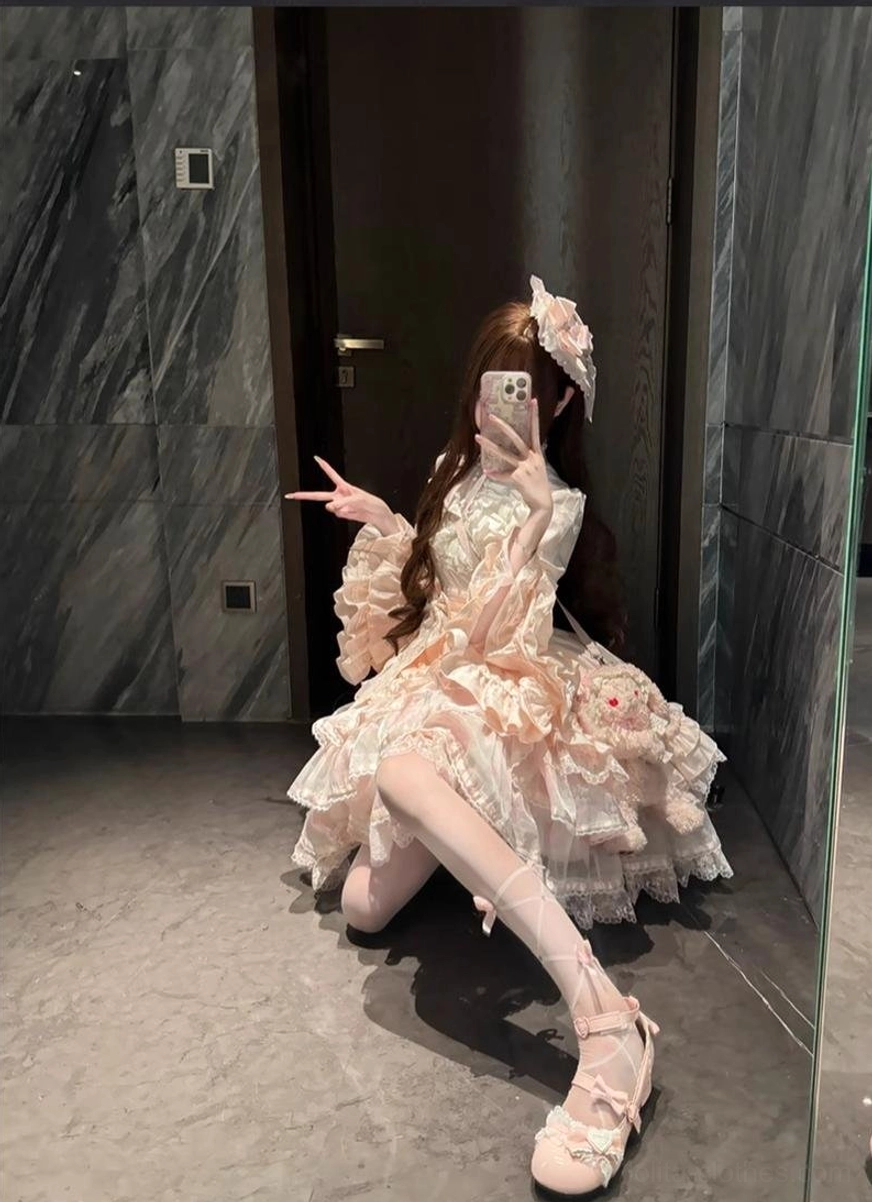 Solo puppet sweet lolita OP dress three-quarter back view model wearing dress showing rear tiered ruffles princess sleeves line A-line silhouette proportion